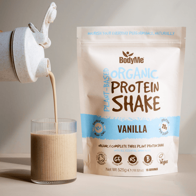 Vanilla Protein Shake - Pouring into Glass - Vegan Protein Shake - BodyMe